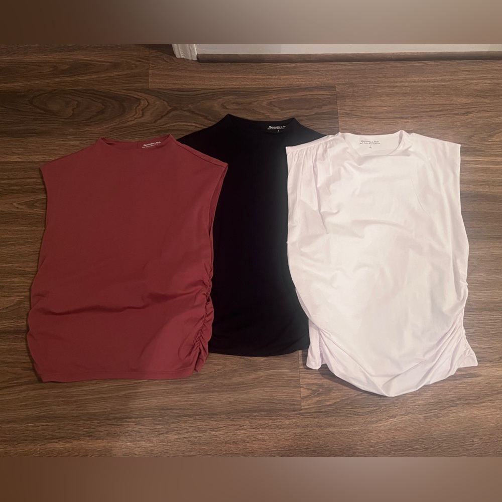 Three Abercrombie and Fitch tank tops. Each worn one time size large.
